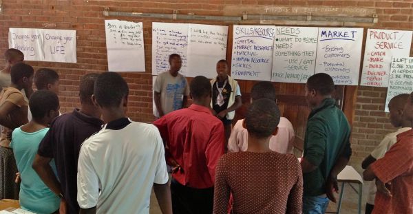 Secondary school students in Malawi discuss entrepreneurship ideas